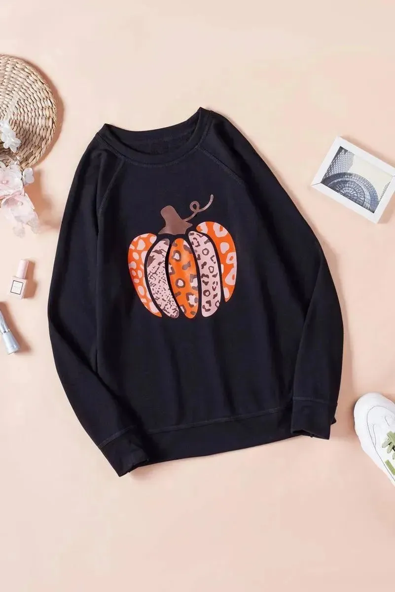 Get cozy in style with our Halloween Pumpkin Graphic Pullover Sweatshirt - perfect for fall festivities!