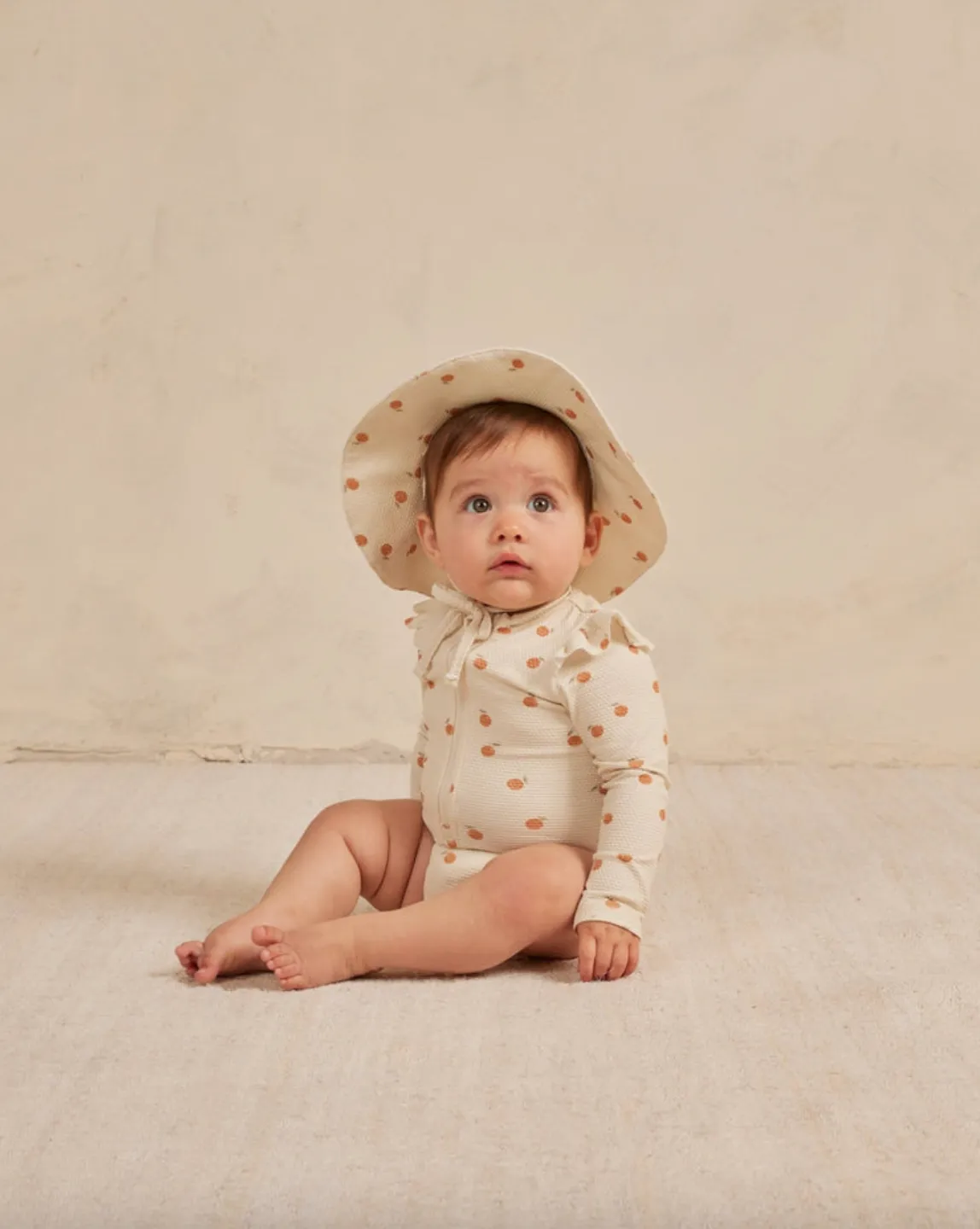 The Byron Rashguard Swimsuit by Quincy Mae - Oranges - BABY